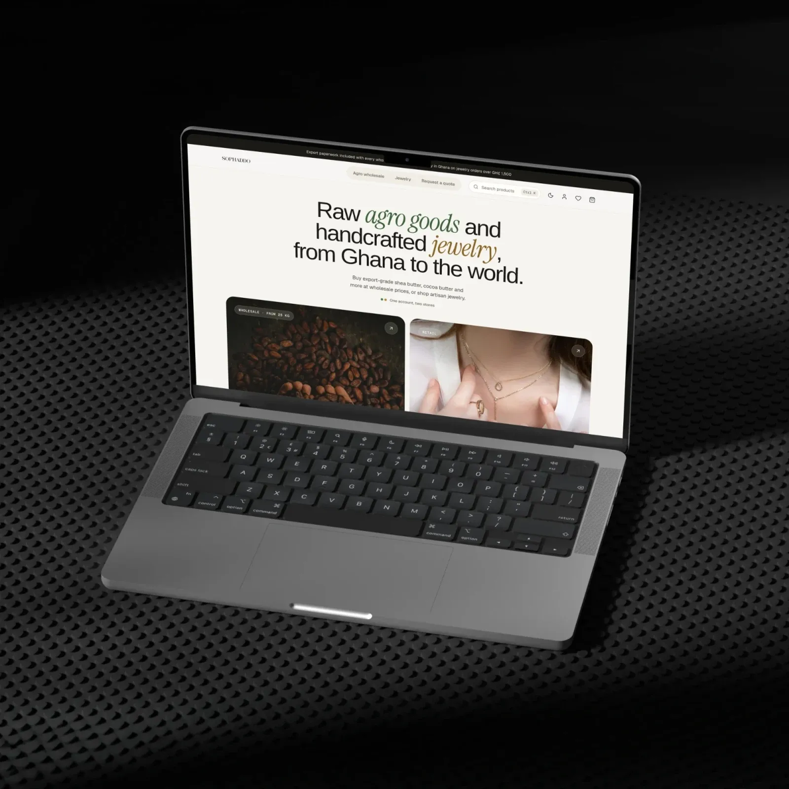 The Sophaddo storefront on a laptop: the split home page offering agro wholesale and handcrafted jewelry